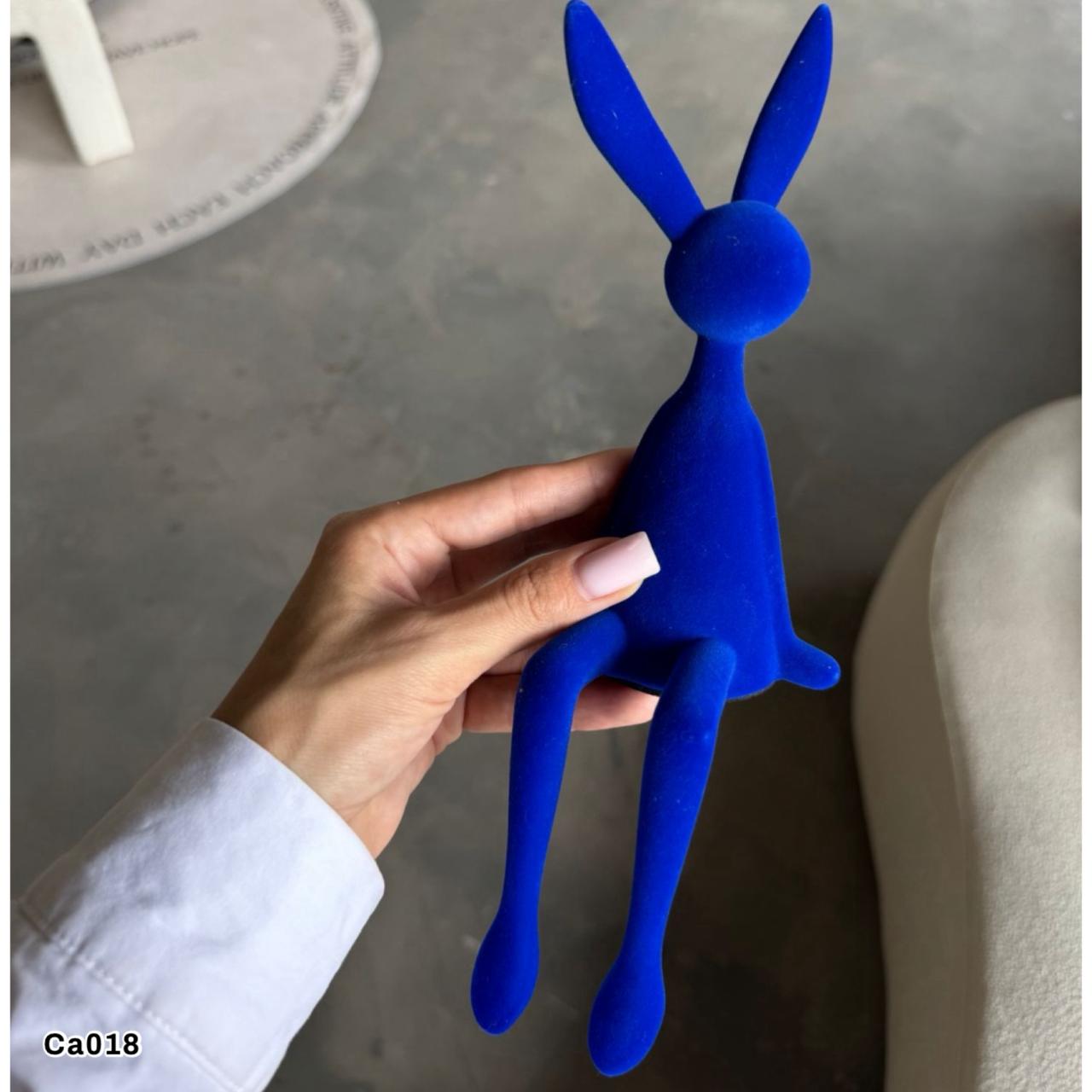 Articulo decorativo conejo pequeño azul 9cm* 9cm* 28cm